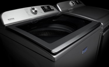 How do you run a diagnostic test on a Maytag Centennial washer