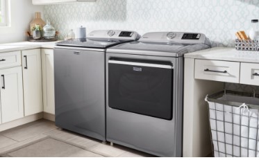 Maytag Centennial dryer heating but not drying